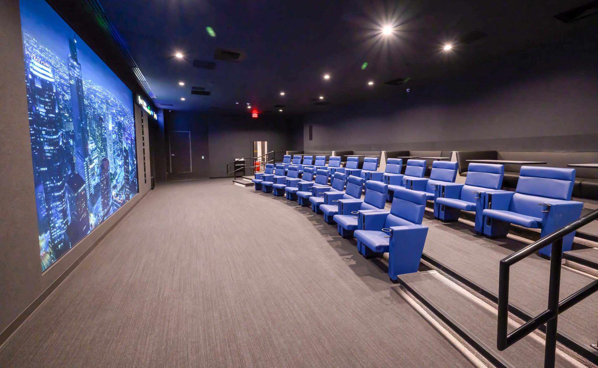 Sports theater with plush seating and full size screen