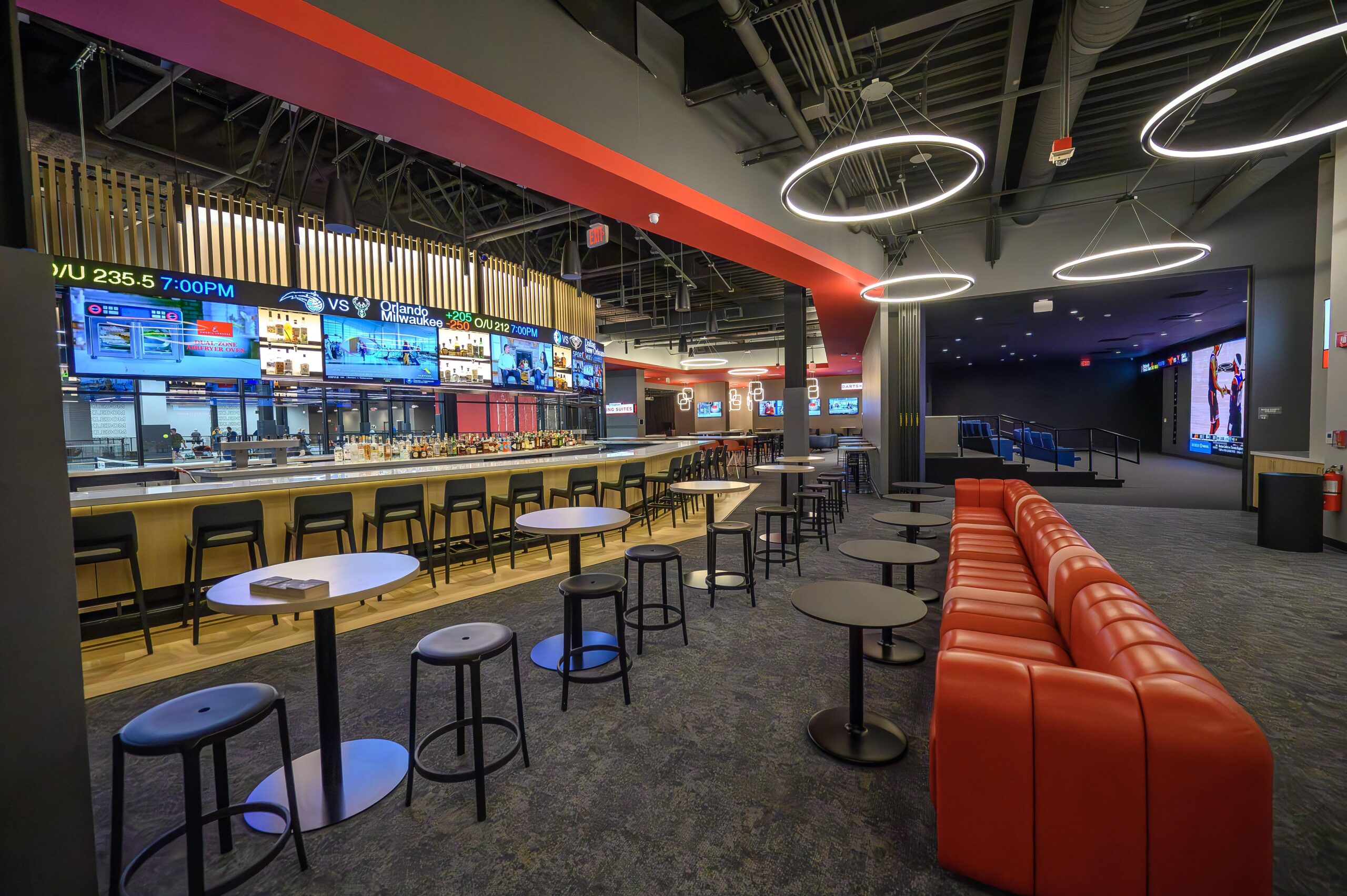 Bosse Sports Lounge with various seating and full bar ready for service.